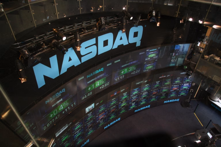 NASDAQ stock market displays at Times Square.