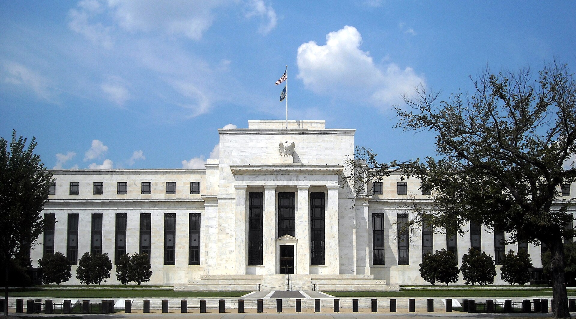 The Marriner S. Eccles Federal Reserve Board Building in Washington, D.C., seen from across the street on a clear day