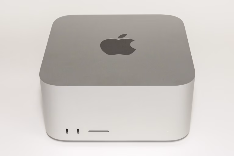 Front view of a silver Mac Studio (2022 model year), compact aluminum enclosure