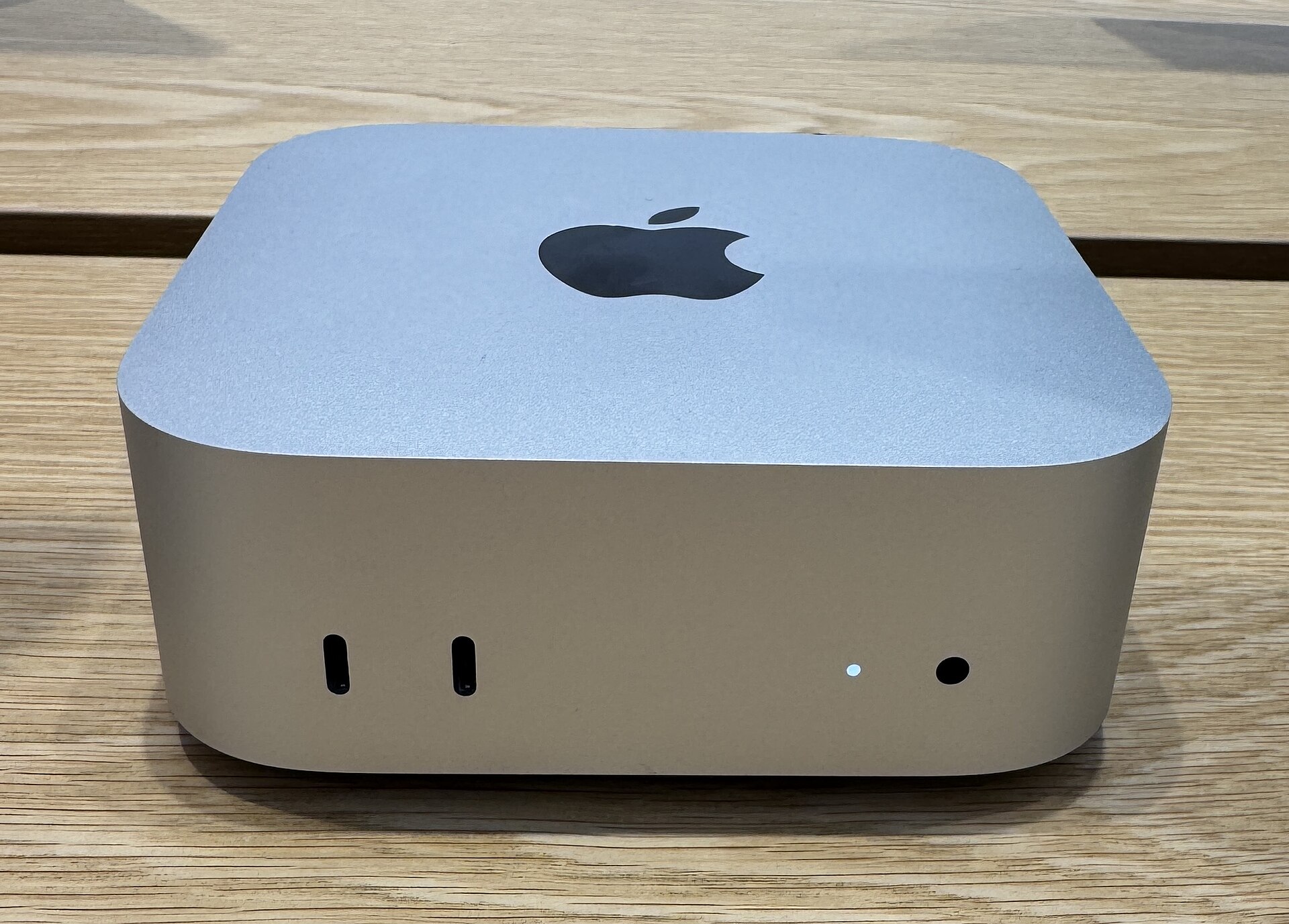 An Apple Mac mini M4 compact desktop computer from 2024.
